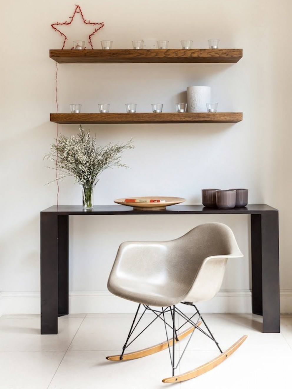 Lion house - Fulham | Feature wall with Eames chair | Interior Designers